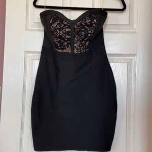 Sexy Windsor black bandage strapless dress in size medium.